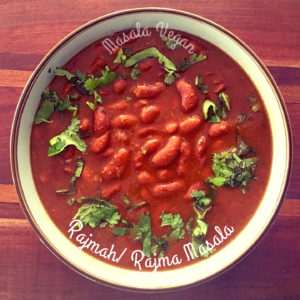 Grey bowl with Rajmah Masala garnished with Coriander leaves