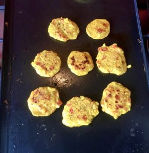 7 Mini Chickpea Flour Omelette on a black grill plate